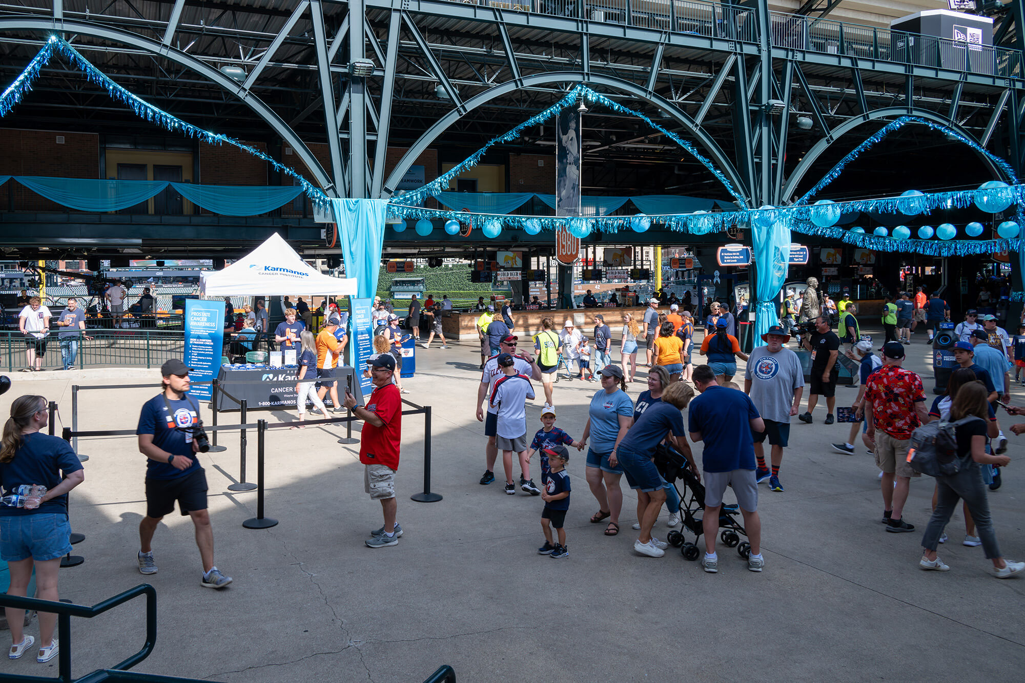Detroit Tigers fans enter Comerica Park for the Prostate Cancer Awareness Night game.