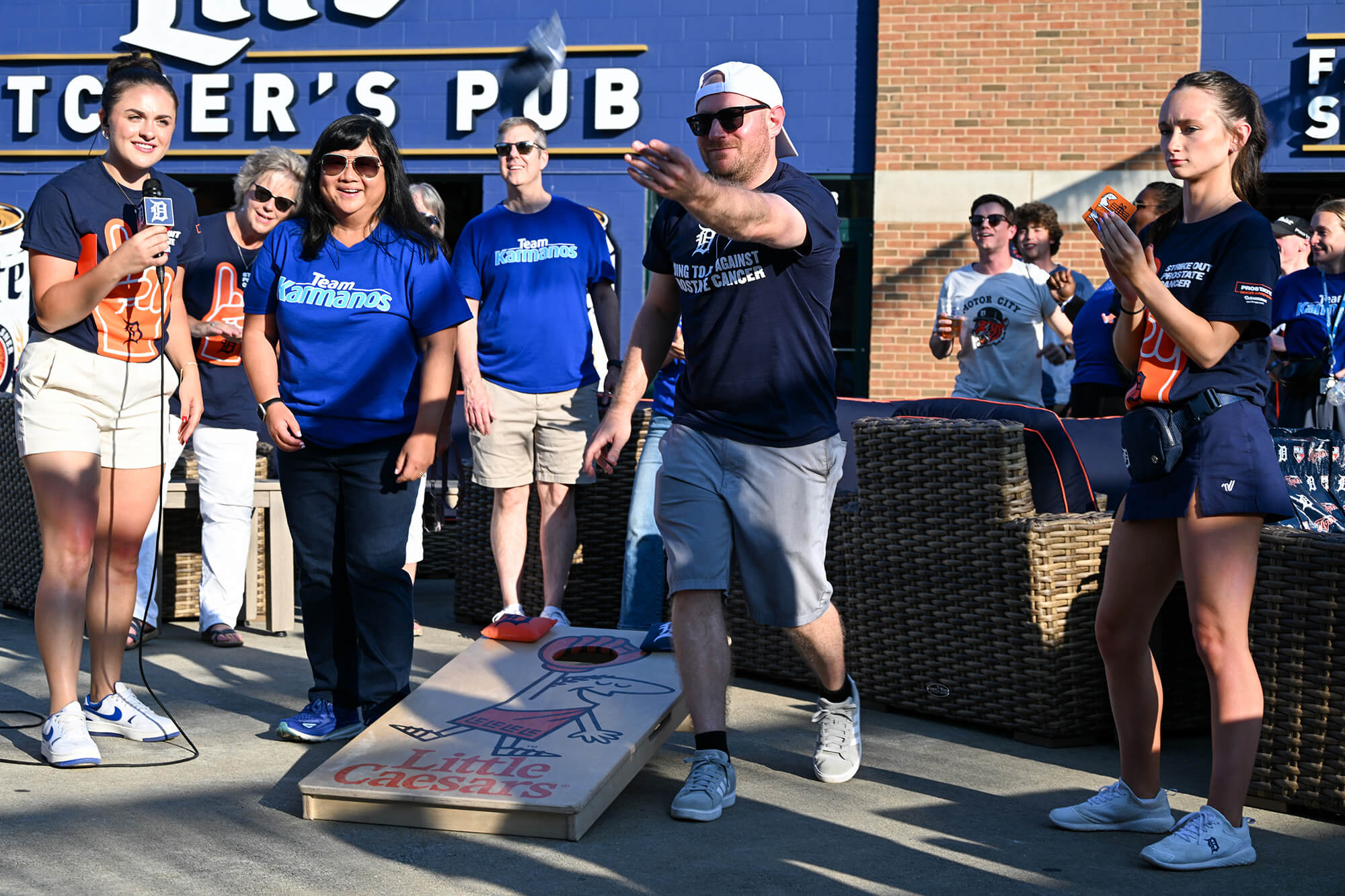 Elisabeth Heath, M.D., FACP, and Kevin Ginsburg, M.D., MS, played a friendly game of cornhole.