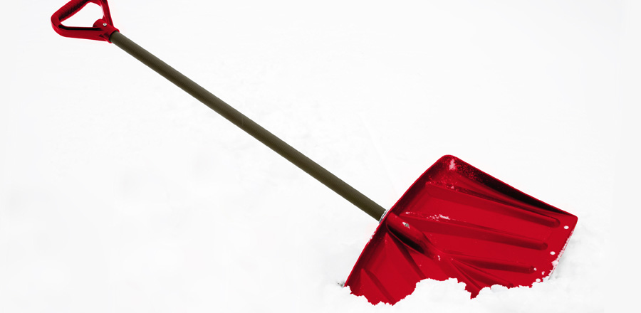 red shovel in snow