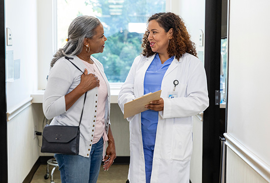 McLaren Port Huron Primary Care Doctor with a female patient