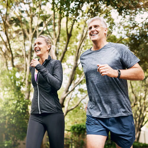 Man and woman exercising running improving heart health